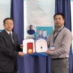 Cai Jianhua from China, Invention: The world-first allicin respiratory therapy instrument,
