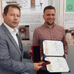IFIA Best Invention Medal is Awarded to Domagoj Buban, Dr.sc. Vladimir Tudic, UDRUGA INOVATORA KARLOVACKE ZUPANIJE for the Invention "ZET SMART PAYMENT SYSTEM" from Croatia IFIA Best Invention Medal is Awarded to Domagoj Buban, Dr.sc. Vladimir Tudic, UDRUGA INOVATORA KARLOVACKE ZUPANIJE for the Invention "ZET SMART PAYMENT SYSTEM" from Croatia