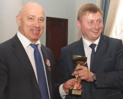 IFIA cup awarded to A. Maltsev, A. Krasnov, P. Salikhanov, A. Beliaev, V. Peshehodov and A. Kluchnikov for the invention "Method of Production of weather-resistant steel" IFIA cup awarded to A. Maltsev, A. Krasnov, P. Salikhanov, A. Beliaev, V. Peshehodov and A. Kluchnikov for the invention "Method of Production of weather-resistant steel"